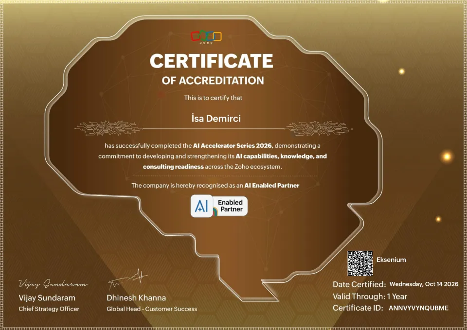 Zoho Certificate of Accreditation belgesi: İsa Demirci, AI Accelerator Series 2026 programını tamamladı; Eksenium, AI Enabled Partner olarak tanındı. Tarih 14 Ekim 2026, geçerlilik 1 yıl, sertifika kimliği ANNVYVYNQUBME.